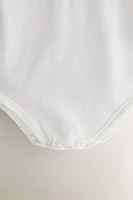 CHILDREN'S BODYSUIT WITH FLORAL EMBROIDERY