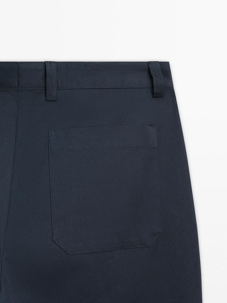 Slim fit cotton blend trousers.