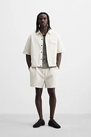BERMUDA RELAXED FIT DÉLAVÉ