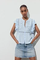 SHORT SLEEVE RUFFLE SHIRT