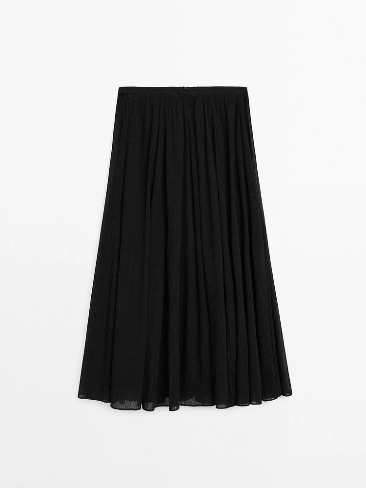 Jupe midi plissée volume