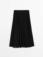 Jupe midi plissée volume