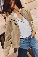 BLOUSON EN MATIÈRE SYNTHÉTIQUE