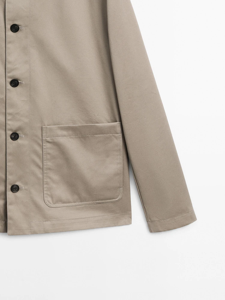 Short jacket with leather collar detail