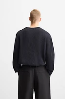 PULL STRUCTURÉ À BOUTONS