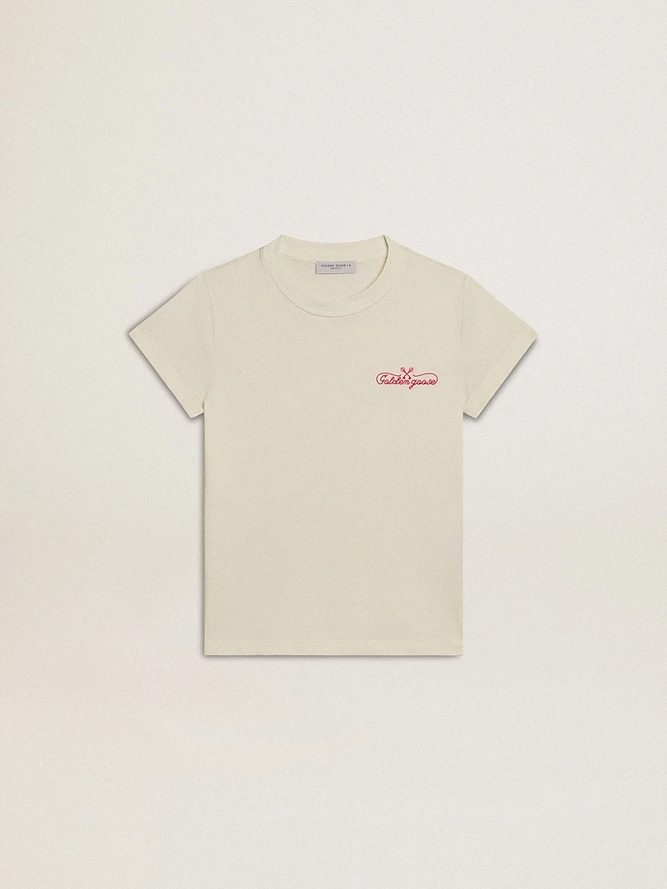 Girls' cotton T-shirt worn white with red embroidery on the chest