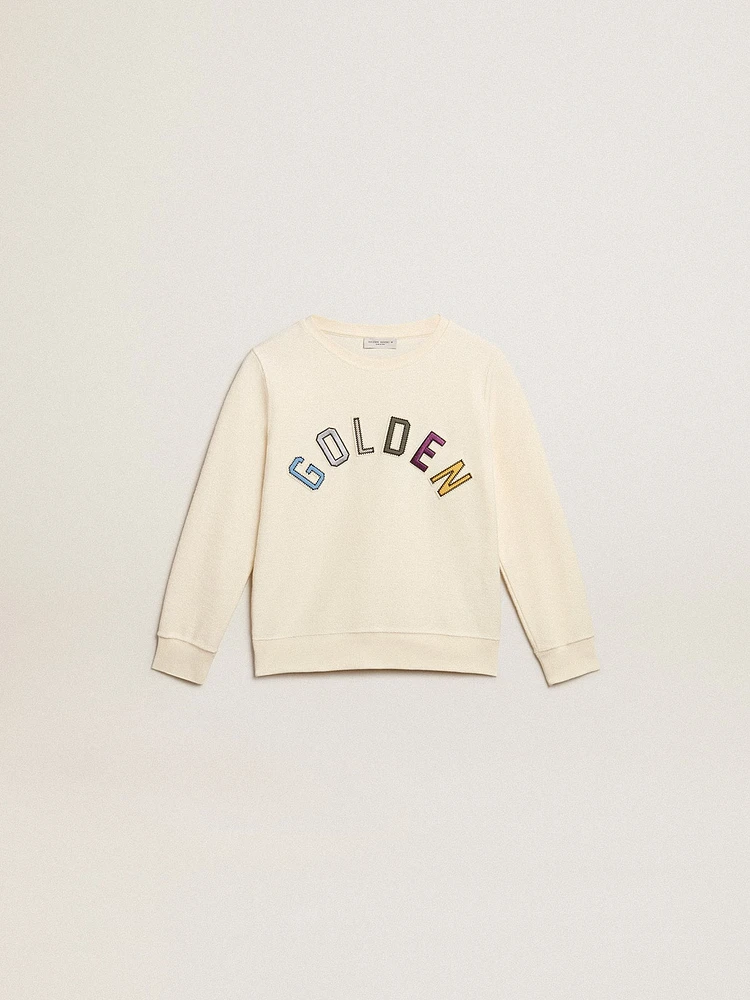 Sweatshirt aged white with multicolor Golden lettering on the front