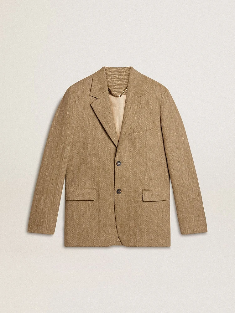 Men's single-breasted blazer a sand-colored chevron linen blend.