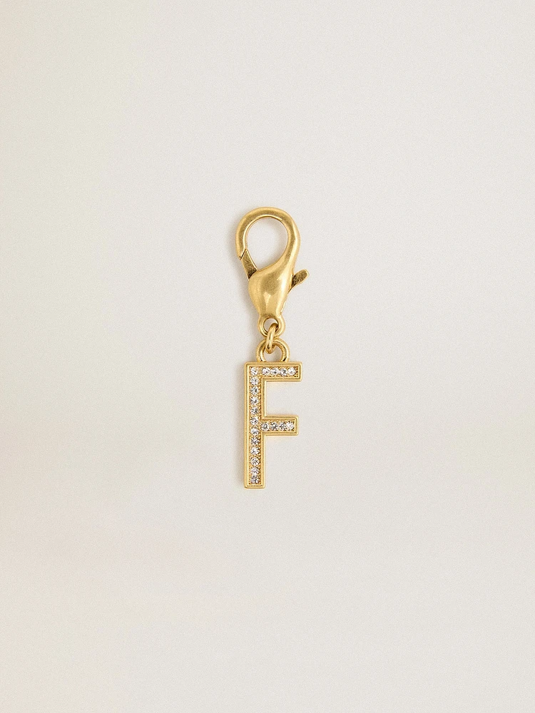 Letter F charm in gold-colored brass with crystals