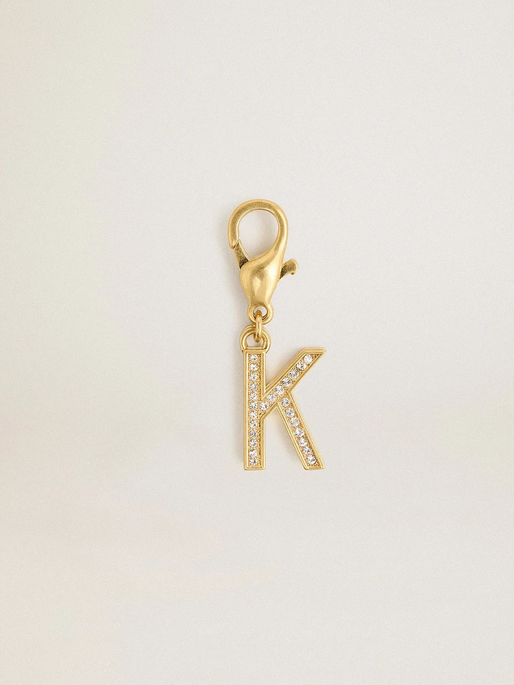 Letter K charm in gold-colored brass with crystals