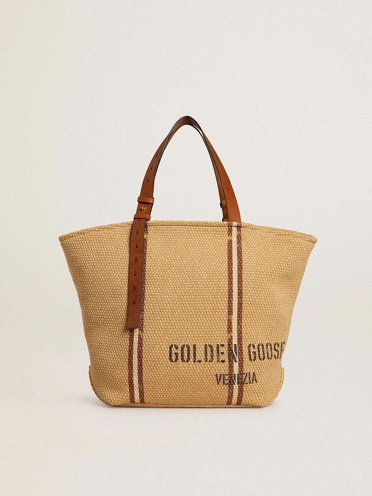 24.7 tote bag in natural raffia and brown leather with gold metallic details