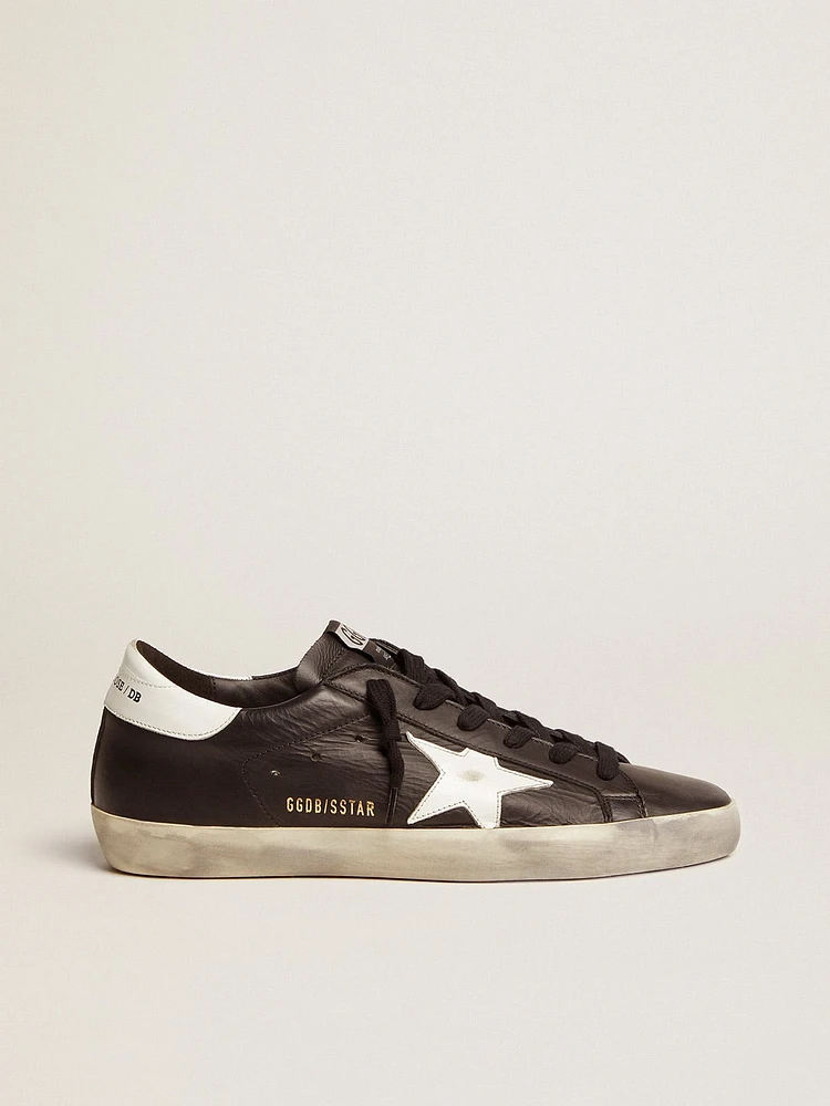 Women’s Super-Star black leather with white star and heel tab