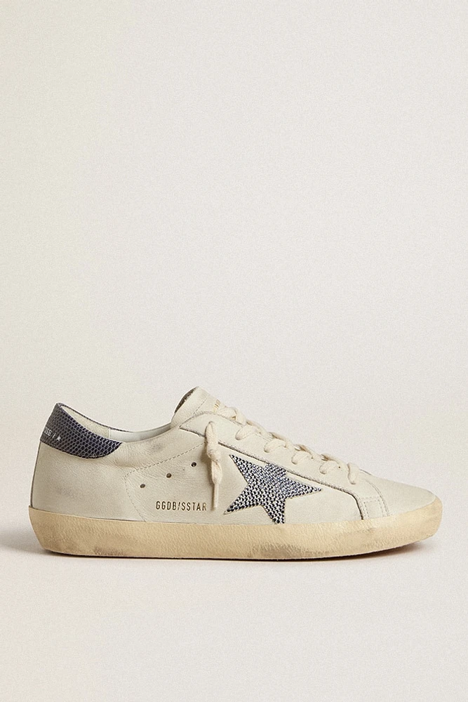 Super-Star LTD with cream-colored leather star with Swarovski crystals and blue leather heel tab with lizard print