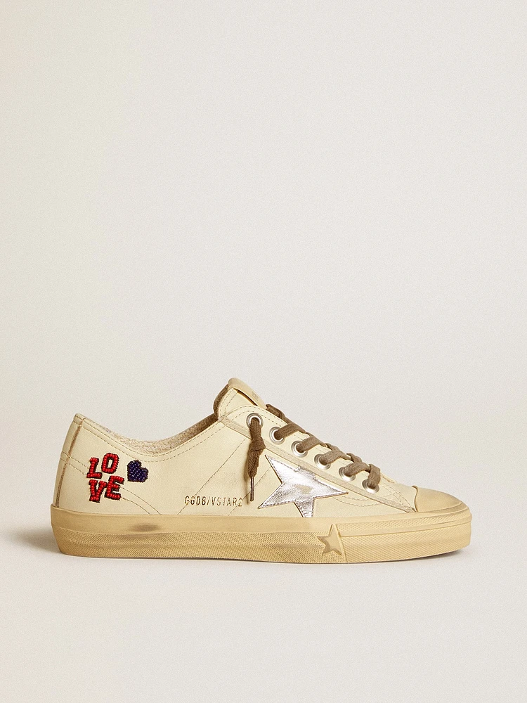 V-Star ecru nappa with silver star and beaded embroidery