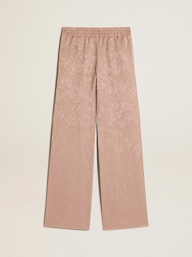 Women's pink viscose pants with floral pattern