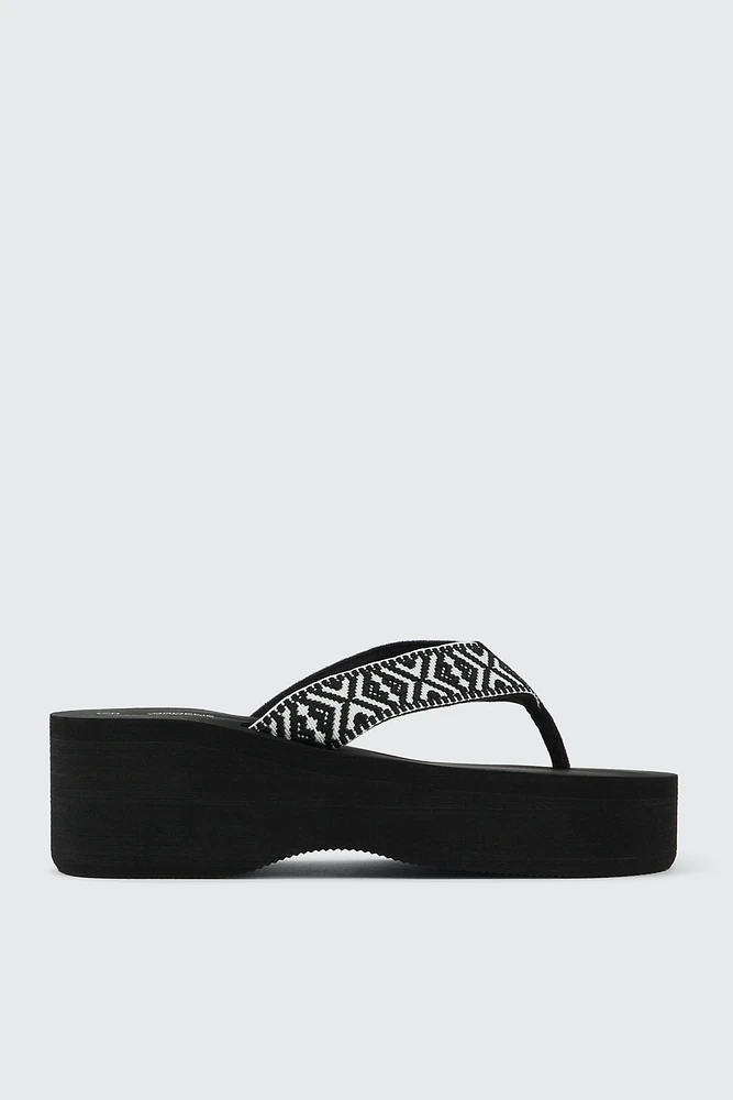 Ardene Geometric Wedge Flip Flops Sandals in Black | Size