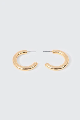 Ardene Thick Tubular Hoop Earrings in Gold | Stainless Steel