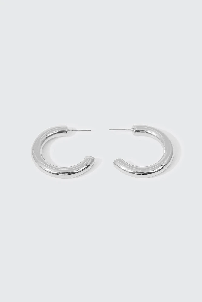 Ardene Thick Tubular Hoop Earrings in Silver | Stainless Steel