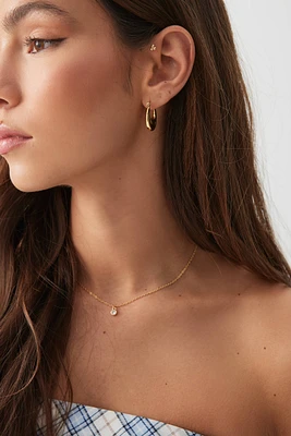 Ardene Stainless Steel Oval Hoop Earrings in Gold