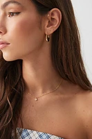 Ardene Stainless Steel Oval Hoop Earrings in Gold