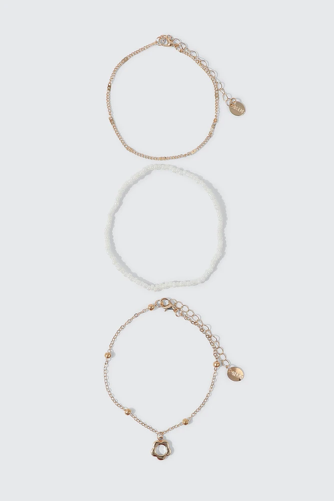 Ardene 3-Pack Daisy Anklets in Gold