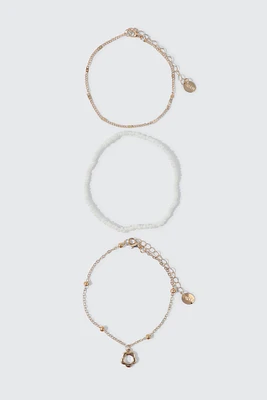 Ardene 3-Pack Daisy Anklets in Gold
