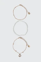 Ardene 3-Pack Daisy Anklets in Gold