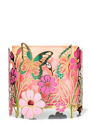 Porte-chandelle à 3 mèches papillons dans le jardin