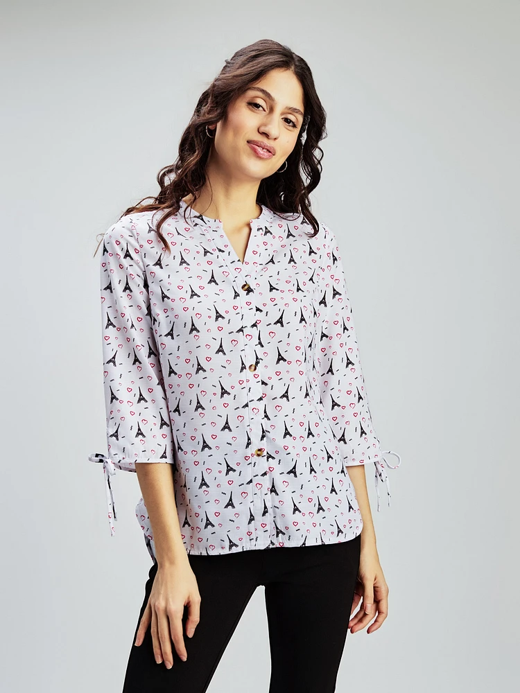 Blouse ample à manches 3/4 avec boutons