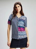 Blouse ample à manches 3/4 avec boutons