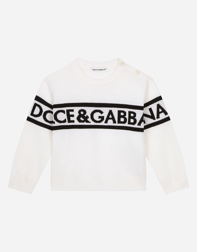 Round-neck sweater with logo inlay