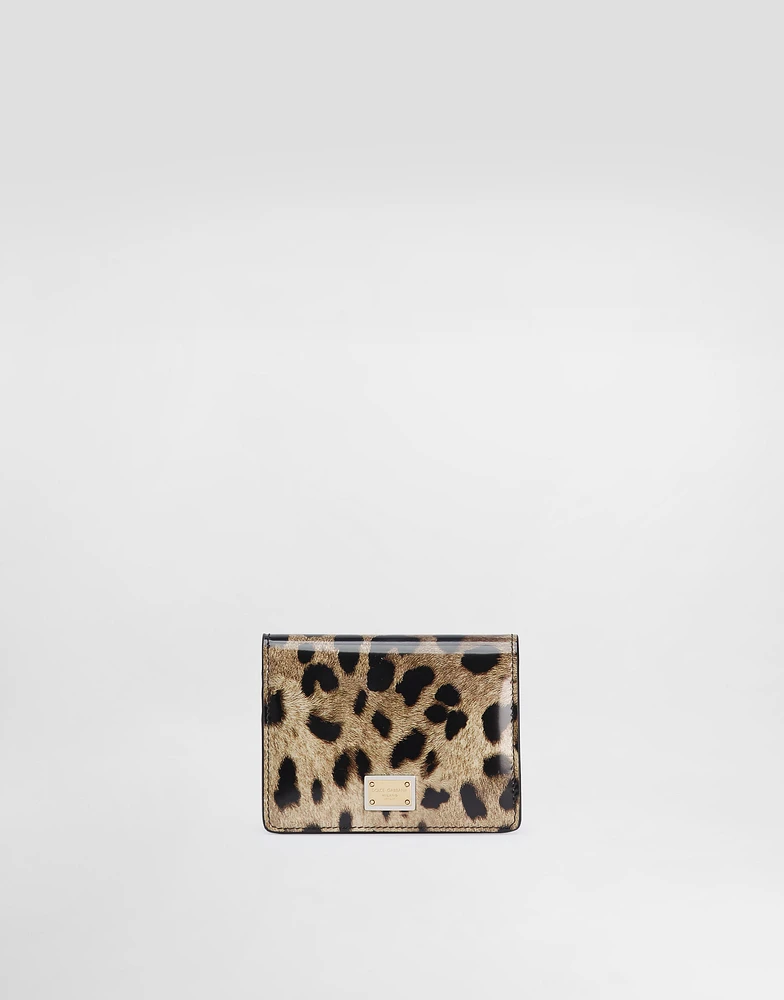 Polished calfskin wallet with leopard print