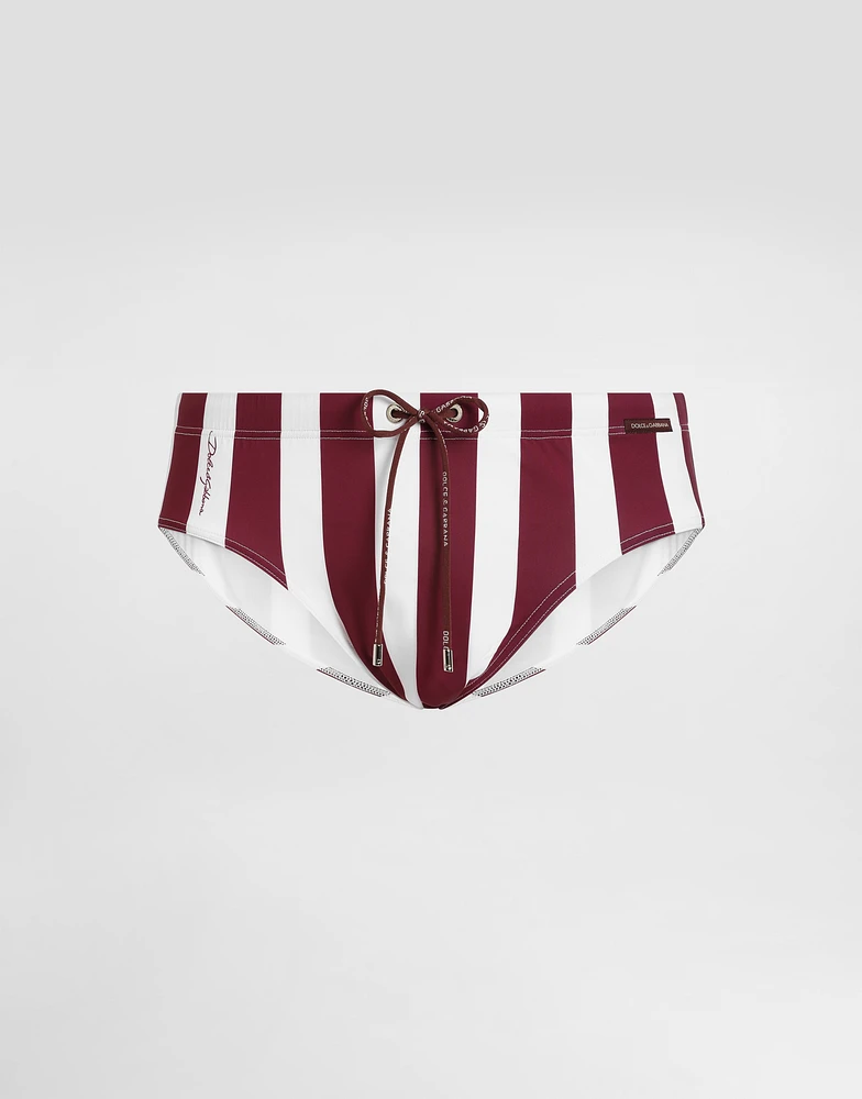 Swim briefs with high-cut leg and striped print