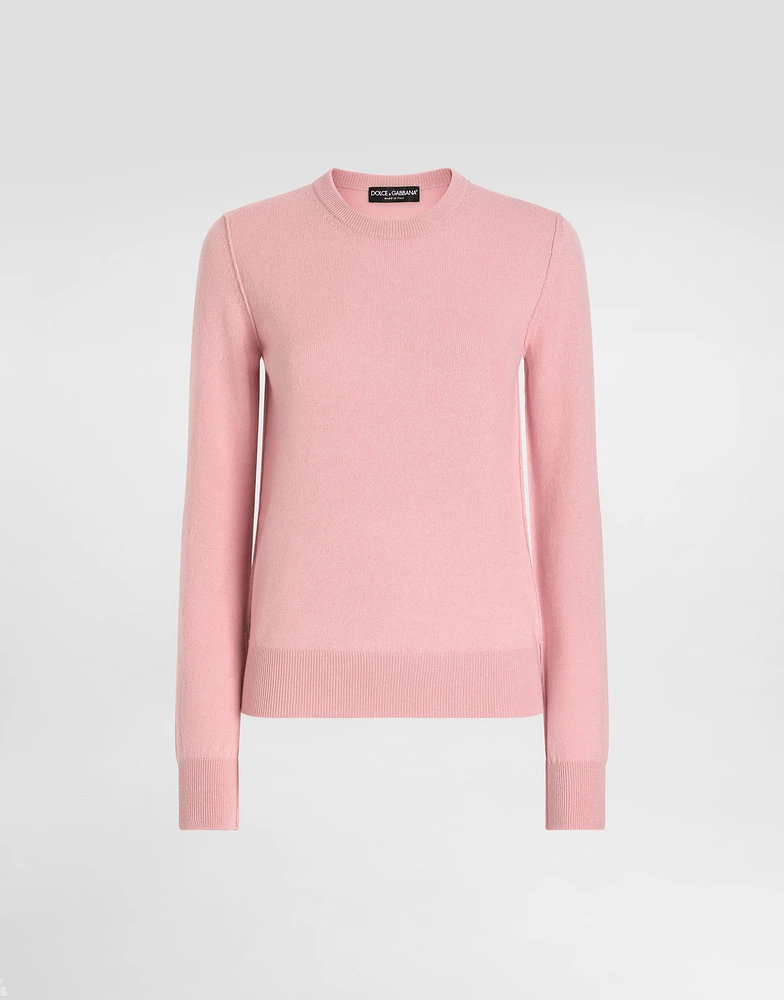 Cashmere sweater with inside-out seams