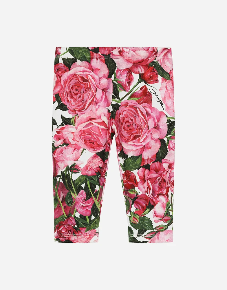 Interlock leggings with rose print over a white background