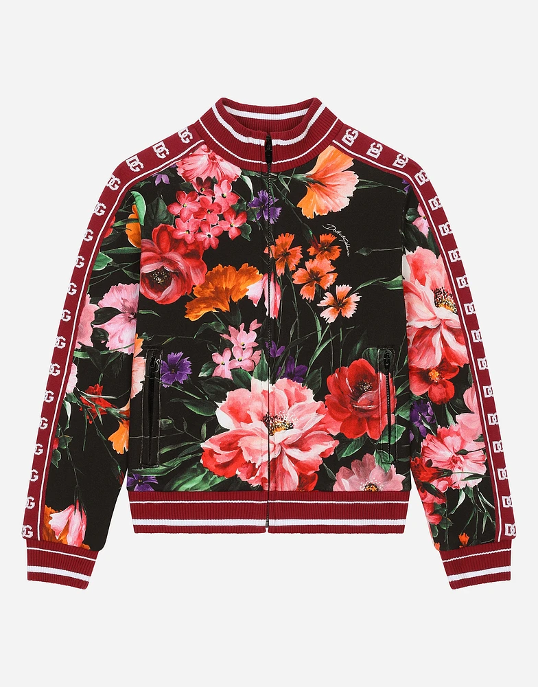 Jersey sweatshirt with floral print over a black background