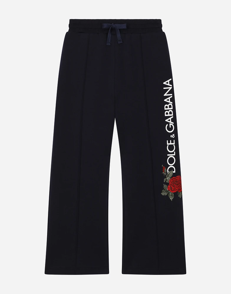Jersey jogging pants with logo and rose print