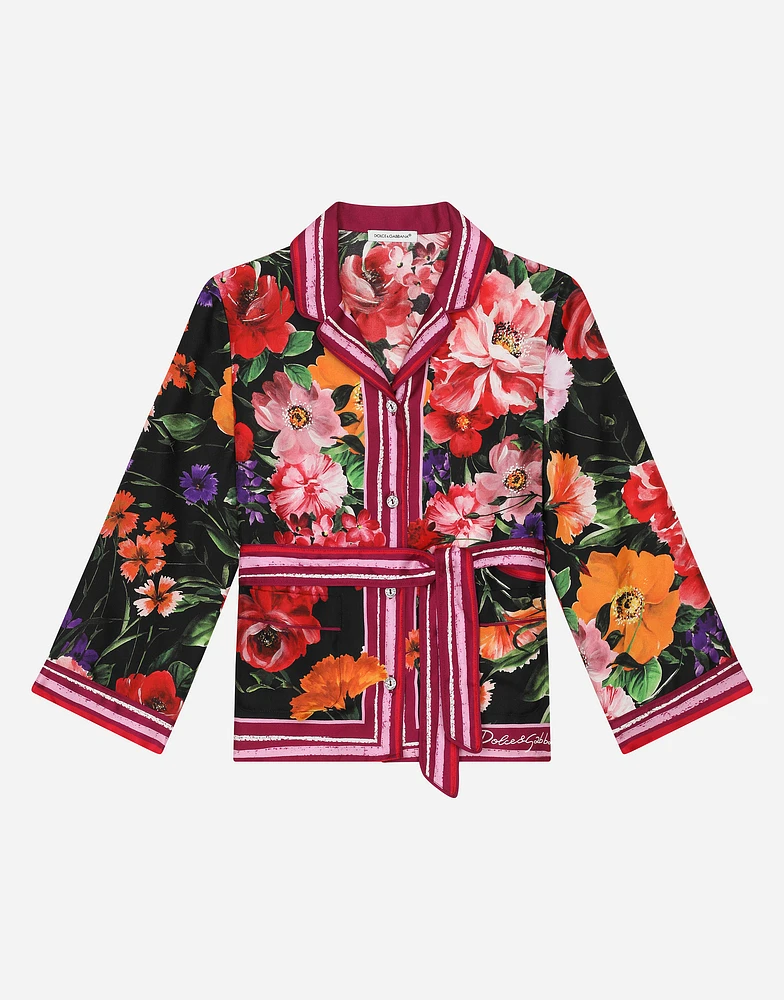 Twill shirt with floral print over a black background