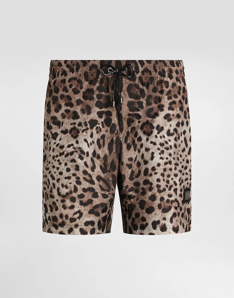 Mid-length swim trunks with leopard print