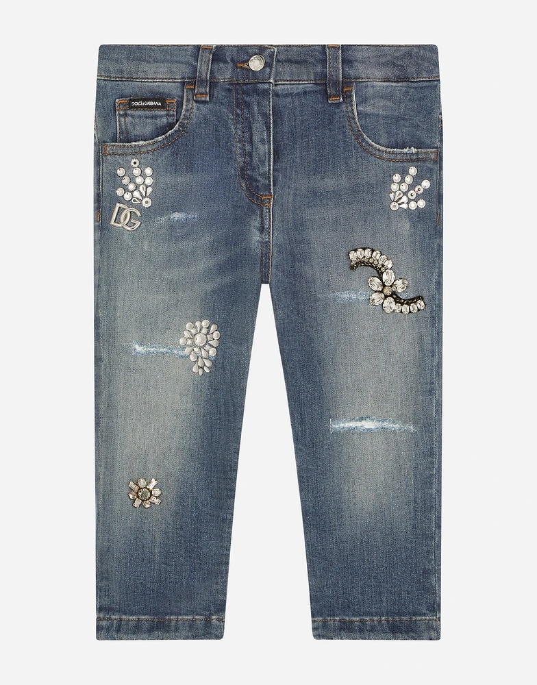 Stretch denim jeans with bejeweled embellishment