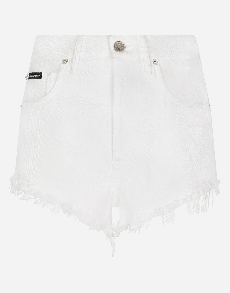 Denim shorts with ripped details and abrasions