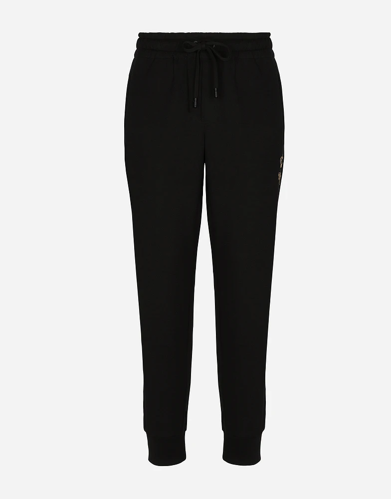 Jersey jogging pants with embroidery