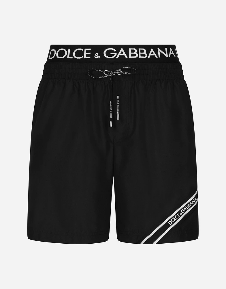 Mid-length swim trunks with branded band