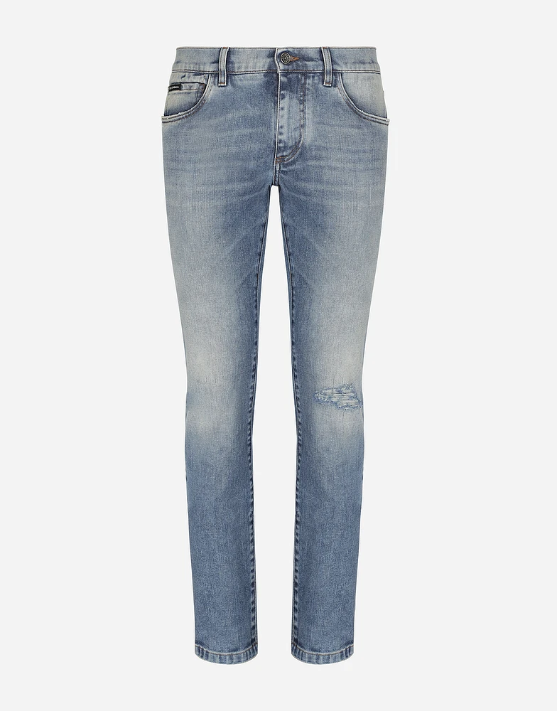 Light blue skinny stretch jeans with rips