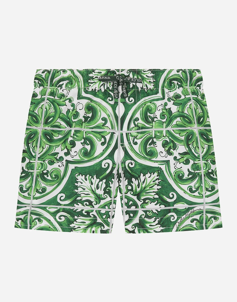 Nylon swim trunks with green majolica print