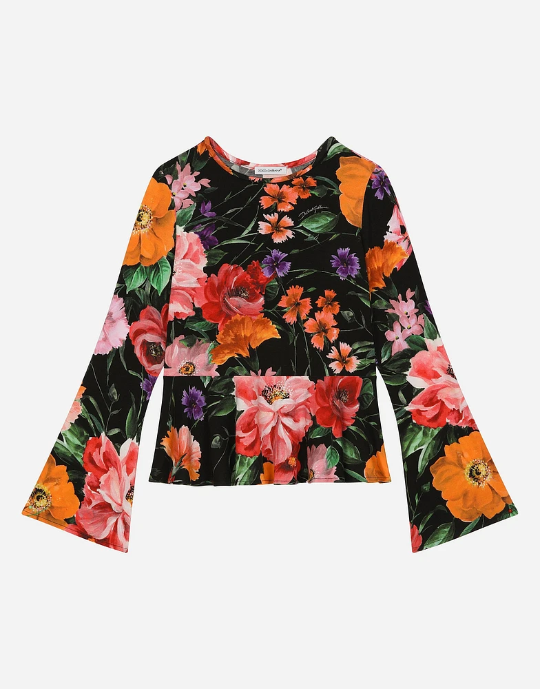 Jersey T-shirt with floral print over a black background