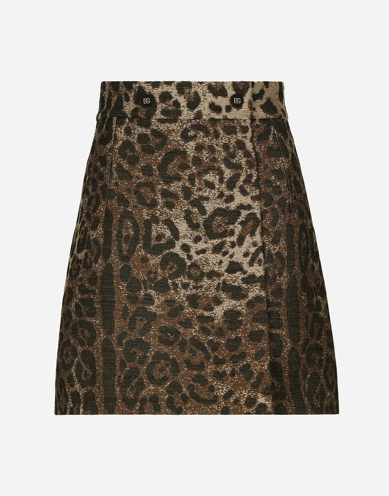 Short wool skirt with jacquard leopard design