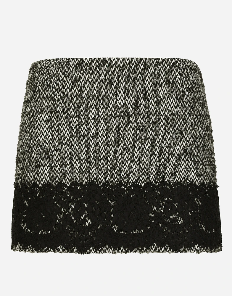 Short micro-tweed skirt with lace insert