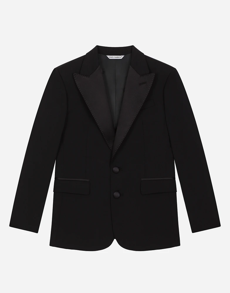 Single-breasted woolen jacket with duchesse inserts
