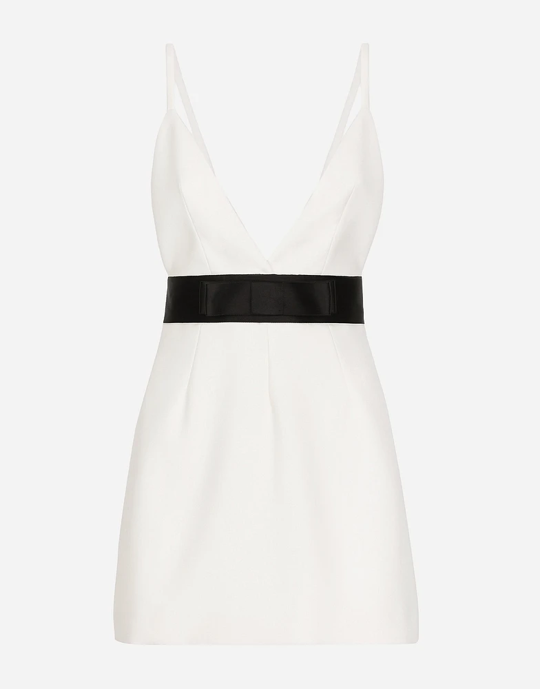 Short woolen dress with satin belt and straps